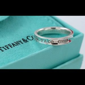 Tiffany and Co. 1837 silver narrow band ring.